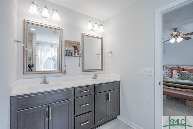 bathroom featuring vanity and ceiling fan