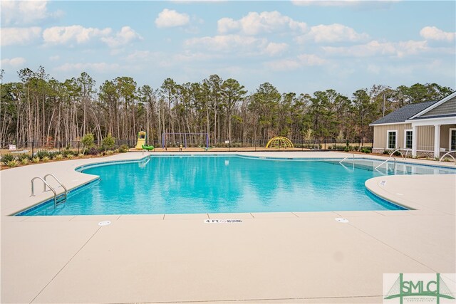 view of pool with a patio