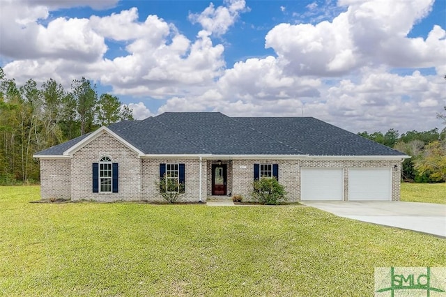 127 Winding Way Rd, Pembroke, GA 31321 - view of front of property featuring an attached garage, concrete driveway, a front yard, roof with shingles, and brick siding