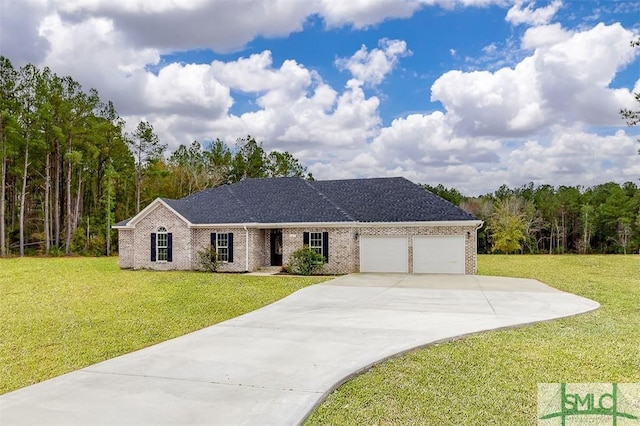 127 Winding Way Rd, Pembroke, GA 31321 - view of front of property with a garage, a front lawn, brick siding, and driveway