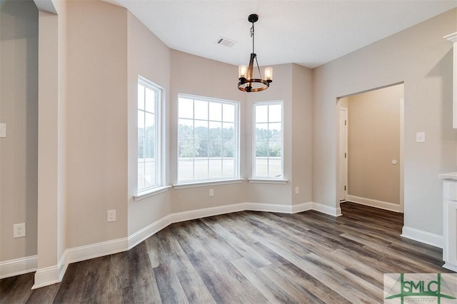 127 Winding Way Rd, Pembroke, GA 31321 - unfurnished dining area with dark wood finished floors and healthy amount of natural light