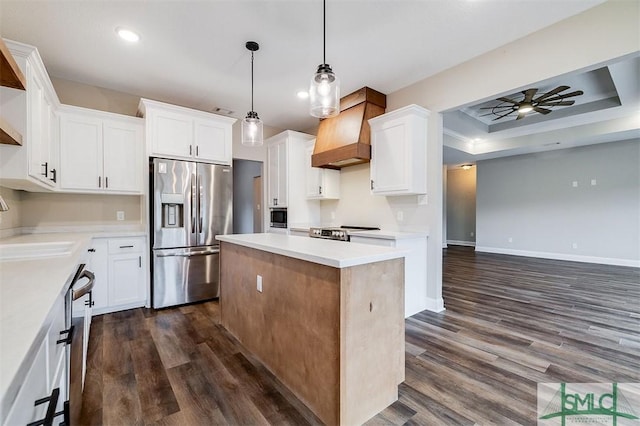 127 Winding Way Rd, Pembroke, GA 31321 - kitchen featuring stainless steel appliances, premium range hood, a center island, dark wood-type flooring, and recessed lighting
