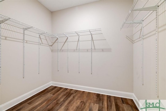 127 Winding Way Rd, Pembroke, GA 31321 - walk in closet featuring dark wood finished floors