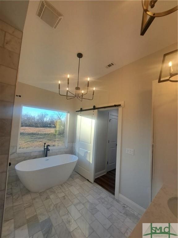 bathroom featuring a bathtub and vanity