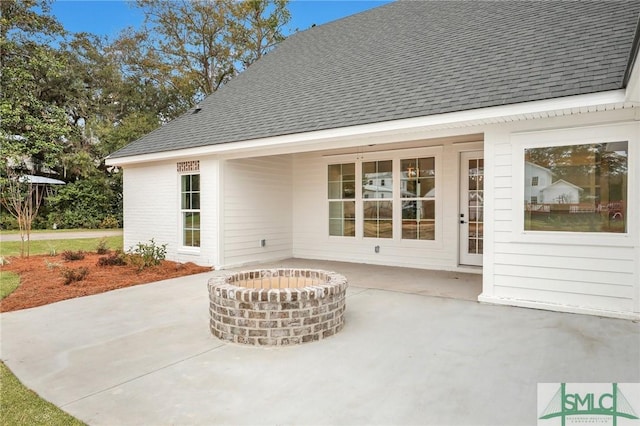 view of patio featuring a fire pit