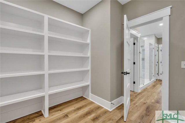 hallway featuring hardwood / wood-style floors