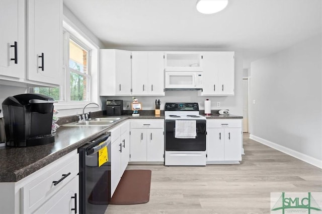 kitchen featuring white microwave, electric range, white cabinetry, dishwasher, and dark countertops