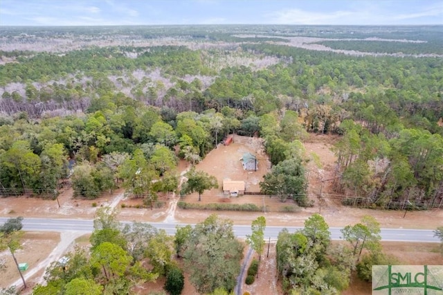 bird's eye view featuring a view of trees