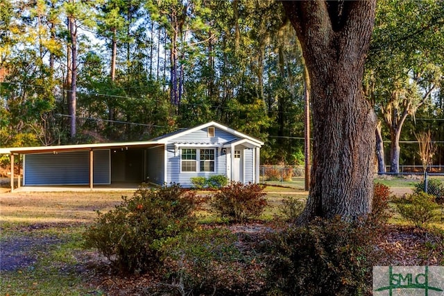 single story home with a carport