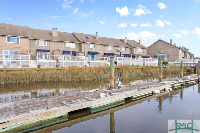 dock area featuring a water view