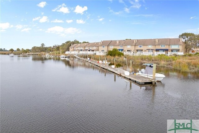 dock area featuring a water view