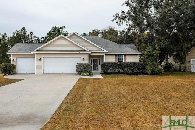 view of front facade with a front lawn and a garage