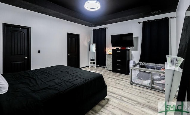 bedroom featuring light hardwood / wood-style flooring