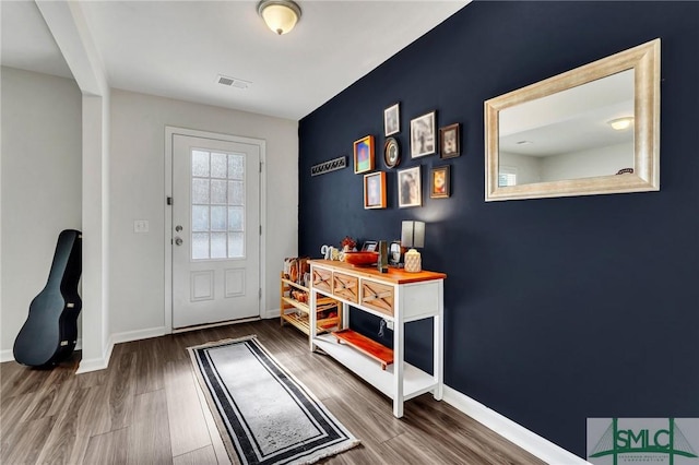 entryway featuring dark hardwood / wood-style floors