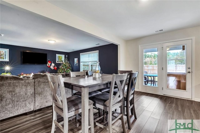 dining room featuring dark hardwood / wood-style floors