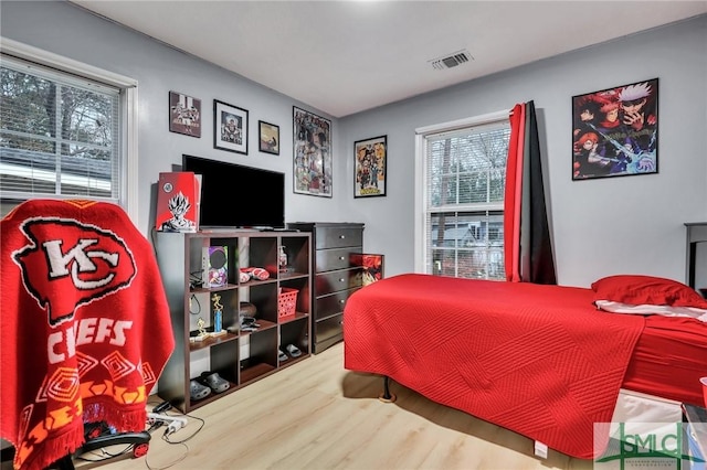 bedroom featuring hardwood / wood-style flooring