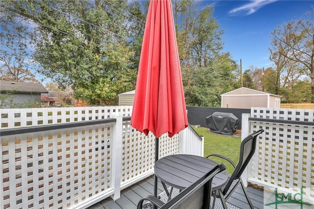 wooden terrace with grilling area