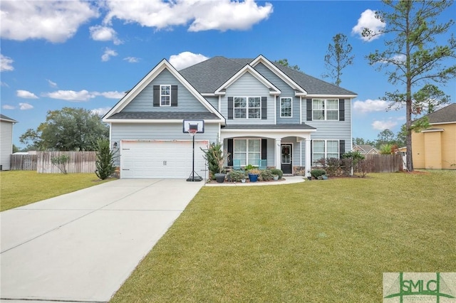 craftsman house with a porch, a garage, and a front yard