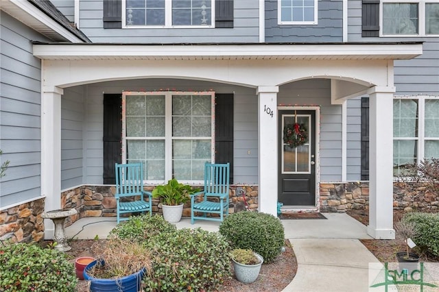 entrance to property with a porch