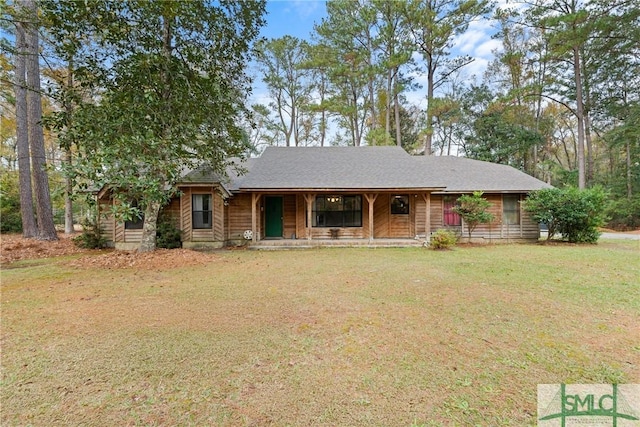 single story home featuring a front yard