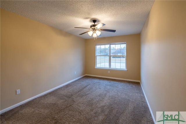 unfurnished room featuring ceiling fan, carpet floors, and a textured ceiling