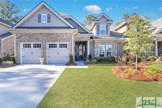 craftsman-style house featuring a garage and a front lawn