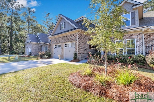 view of front of property with a front lawn and a garage