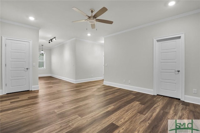 empty room featuring baseboards, a ceiling fan, ornamental molding, wood finished floors, and recessed lighting