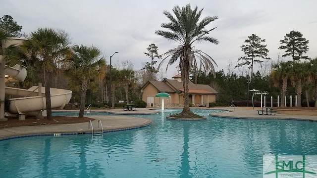 pool featuring a patio area