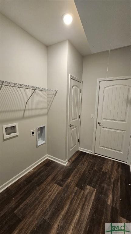 clothes washing area featuring washer hookup, dark wood finished floors, electric dryer hookup, laundry area, and baseboards