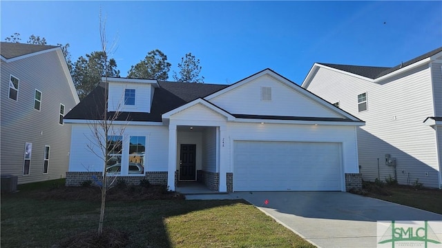 view of front of property with a garage, brick siding, concrete driveway, and a front yard