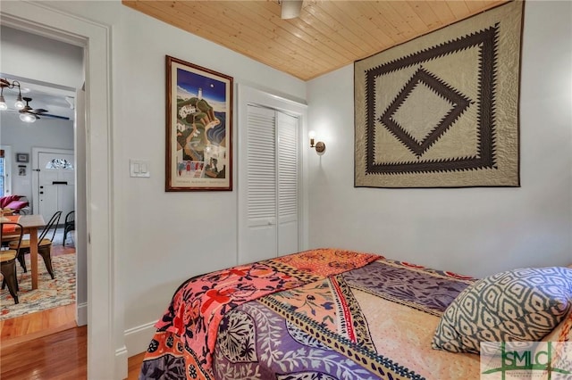 bedroom featuring a closet and hardwood / wood-style flooring