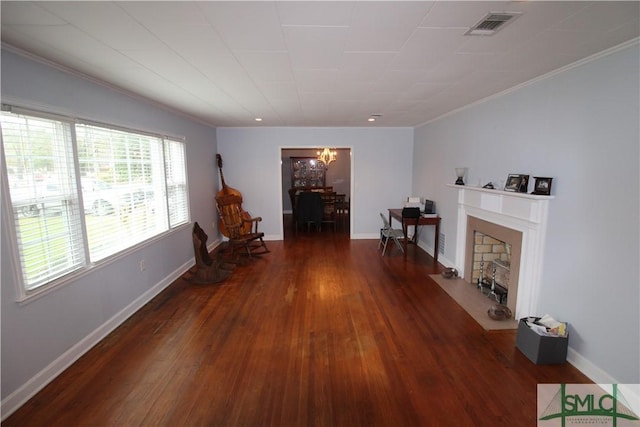 living area featuring a chandelier and dark wood-type flooring