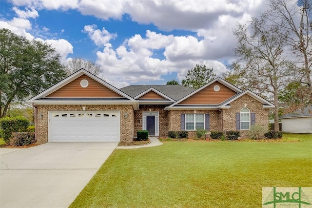 view of front of property with a front yard and a garage