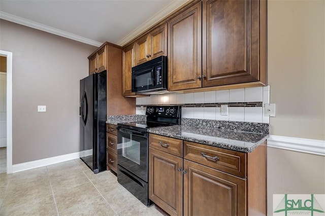 kitchen featuring black appliances, ornamental molding, backsplash, and dark stone counters