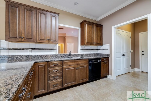 kitchen with sink, crown molding, decorative backsplash, dark stone countertops, and black dishwasher