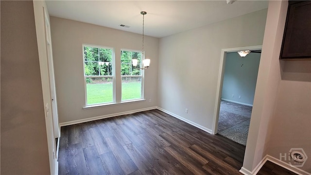 174 Brookline Dr, Savannah, GA 31407 - unfurnished dining area with plenty of natural light, dark wood-style floors, and a chandelier
