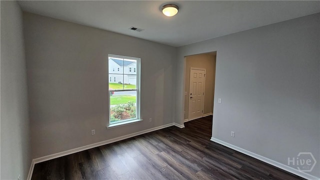 174 Brookline Dr, Savannah, GA 31407 - spare room featuring dark wood-type flooring and baseboards