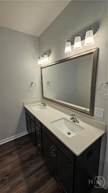 174 Brookline Dr, Savannah, GA 31407 - full bath featuring wood finished floors and double vanity