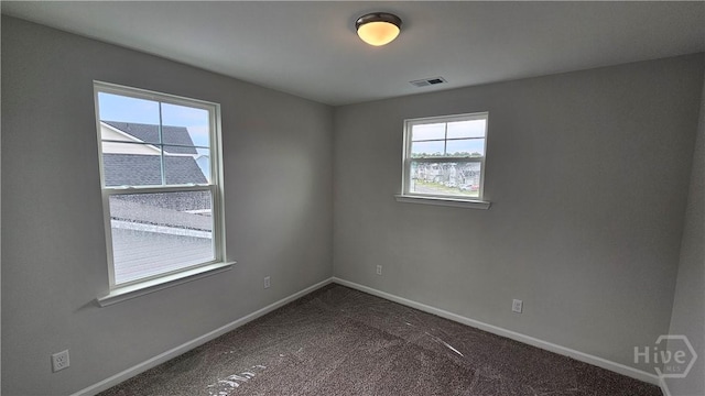 174 Brookline Dr, Savannah, GA 31407 - unfurnished room with baseboards and dark carpet