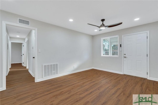 entrance foyer featuring dark hardwood / wood-style flooring and ceiling fan