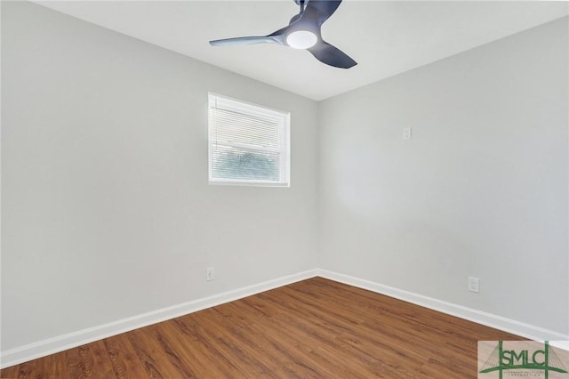 unfurnished room with ceiling fan and hardwood / wood-style flooring