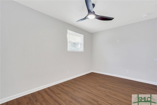 spare room with ceiling fan and hardwood / wood-style flooring