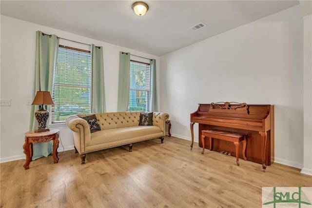 sitting room with light hardwood / wood-style floors