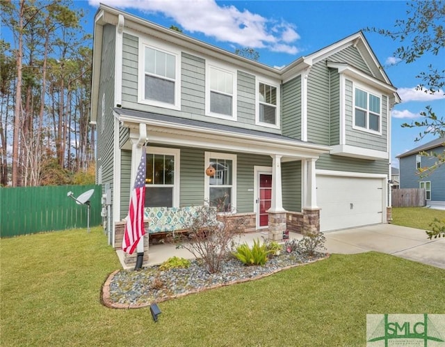 view of front facade featuring a garage and a front lawn