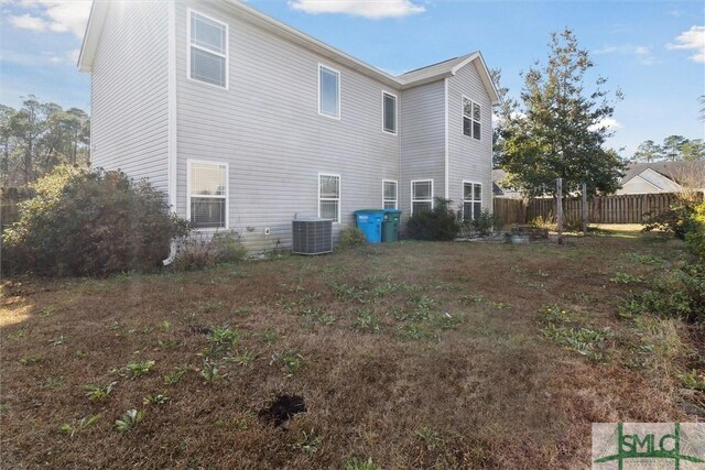 back of property with central air condition unit