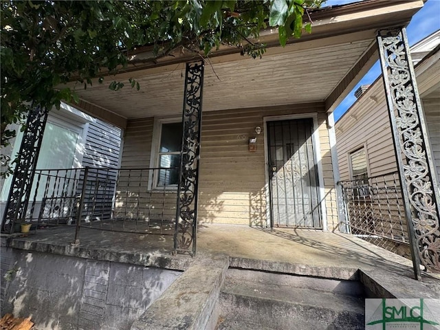 property entrance with a porch