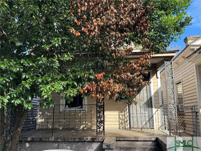 view of home's exterior with covered porch