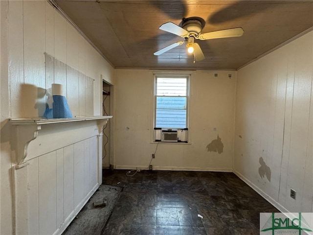 spare room featuring wood walls, cooling unit, wooden ceiling, and ceiling fan