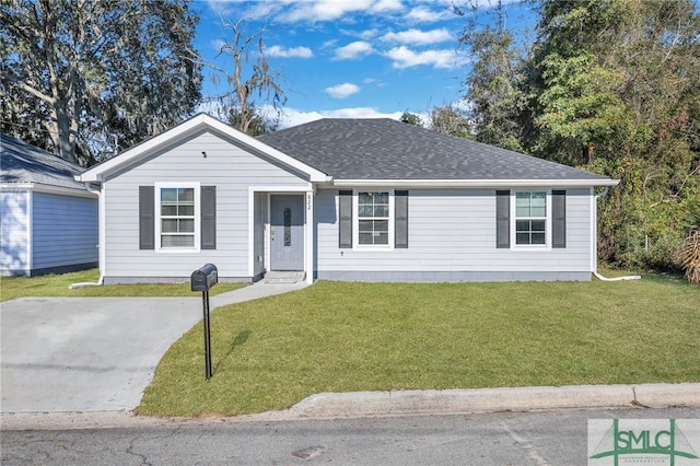 single story home with a front yard